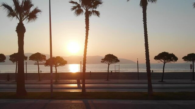 Vlora, albania at sunset with urban landscape and surrounding hills in the distance, aerial view