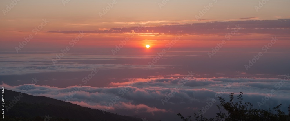 Poster scenic sunset over clouds with expansive sky and empty space for text overlay