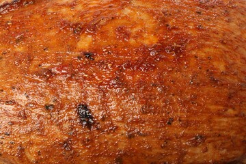 Piece of delicious baked turkey as background, closeup