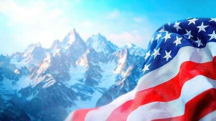 American Flag Waving Proudly Against Majestic Snowy Mountain Peaks and Blue Sky on a Bright Sunny Day