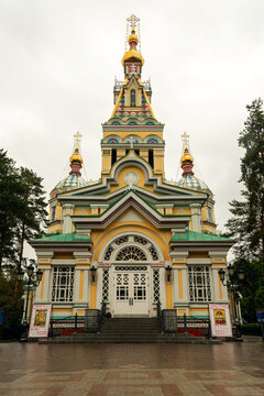 Ascension Cathedral, a Russian Orthodox cathedral located in the Panfilov Park in Almaty, Kazakhstan, built by Zenkov's design. Old, completely wooden church. Spring photography of the church.