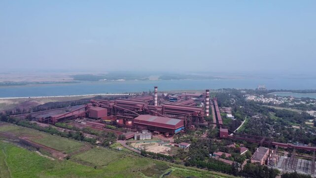 Indian iron plant. Shot of a massive old steel factory in the industrial area in india. industry and pollution in a single footage.