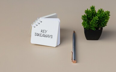 Key Takeaways Note on Desk – Top View