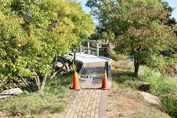 The closed wood bridge in the park.