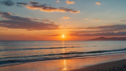 Fototapeta premium Sunset over calm ocean waters with waves lapping on sandy beach under a colorful sky with clouds and distant hills in the background
