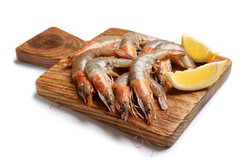 Fresh raw shrimps and lemon isolated on white