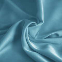 photo of light blue silk fabric template of fabric roll of fabric