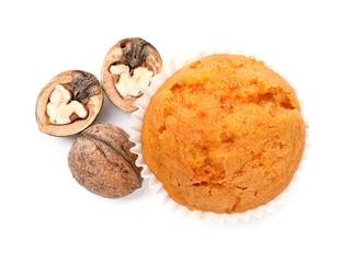 Tasty sweet carrot muffin and walnuts isolated on white, top view