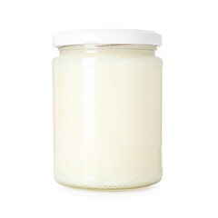 Organic coconut cooking oil in glass jar isolated on white