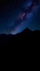Naklejka premium Generative AI Mountain Silhouette Under a Starry Night Sky Scenery