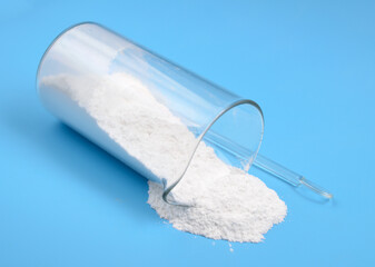 Talc powder on blue background
