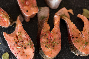 Close-up of fresh salmon steak with spices