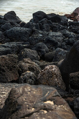 a rocky shore of poiupu beach 
