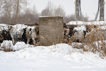 Overground heat pipes. Pipeline above the earth conducting heat for heating city. A snowy winter day