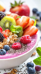 Colorful smoothie bowl with granola and fresh fruit for breakfast