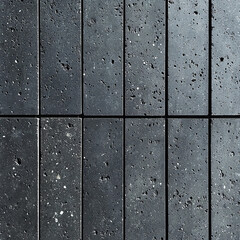 Dark gray, textured stone tiles arranged in a grid pattern
