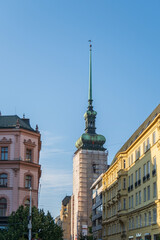 Slender church tower with green patina spire