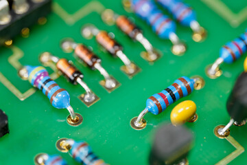 Resistor with strips on the circuit board.