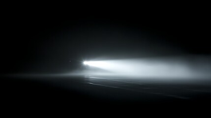 Navigating the void, Car headlights pierce through dense atmospheric obscurity