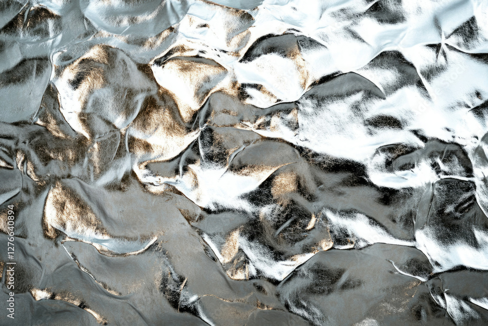 Poster abstract image of crumpled silver foil with light reflections, showcasing texture and metallic sheen