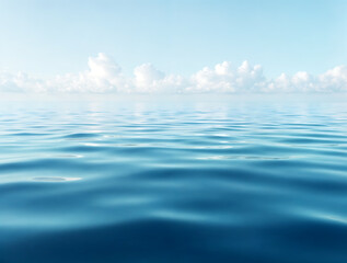 Obraz premium A serene and vast ocean with clear blue waters, calm waves, and a beautiful sky, perfect for relaxation and inspiring peaceful moments in nature