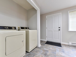 Modern residential laundry room interior