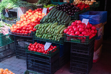 fruits and vegetables at the farmer's market, a counter with fresh fruits and vegetables