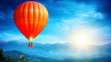Fototapeta premium Orange Hot Air Balloon Ascending Over Misty Valley at Sunrise