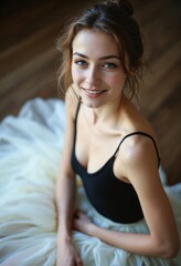 Fototapeta premium Woman in her early 20s. She is a ballerina. Soft natural lighting