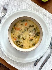 Homemade Creamy fish chowder soup in bowl
