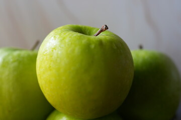 green apples on a white background
