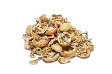 Pile of walnut shells. Isolate on white.