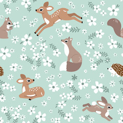 Seamless vector pattern with cute fawn, rabbit, fox and hedgehog on floral background. Hand drawn woodland illustration. Perfect for textile, wallpaper or print design. EPS10 vector file.