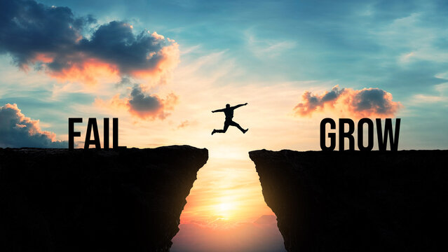 Silhouette of a person jumping from fail to grow over gap between cliffs at sunset, learning from failure, personal development, resilience, self-improvement, success through mistakes, growth mindset