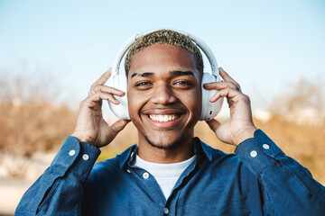 Portrait of a boy with a headset smiling looking at the camera