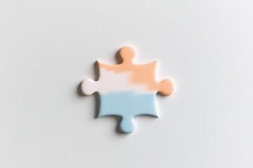 Obraz premium puzzle piece gently isolated against minimalist white backdrop symbolizes autism awareness creating emphasis on diversity
