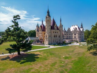 Fototapeta premium Palace in Moszna - a historic residence located in the village of Moszna, in the Opolskie Voivodeship, Poland.