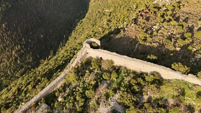 Aerial view of Kelefa Castle and its tower and walls during sunset, Mani, Laconia, Greece.