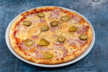 fresh pizza on the white plate