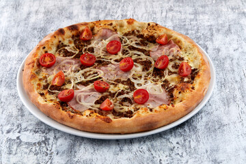 fresh pizza on the white plate