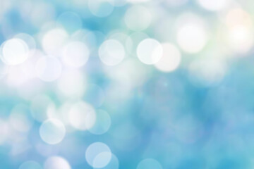 Obraz premium Blue glow light natural bokeh, holiday light blur wallpaper