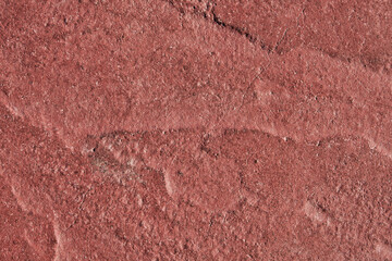 Red stone natural texture background. Close up texture and natural patterns, rustic background perfect for design projects. Mock up.
