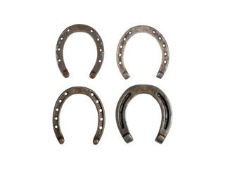 Vintage old horse shoes set isolated isolated on white background.