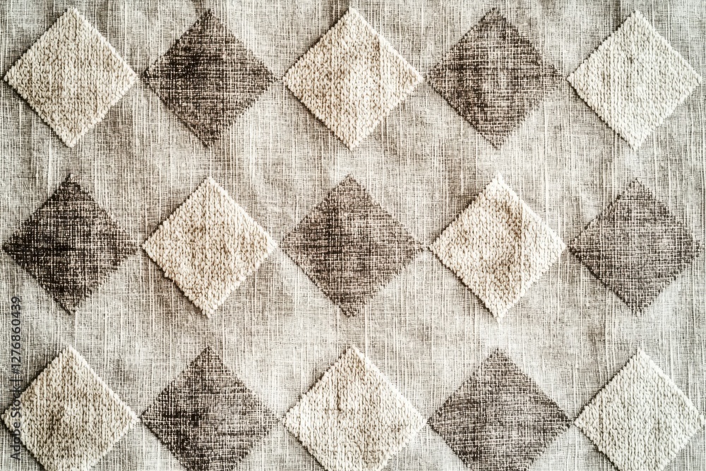 Poster textured diamond pattern fabric in neutral tones, offering a versatile background for design project