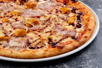 fresh pizza on the white plate