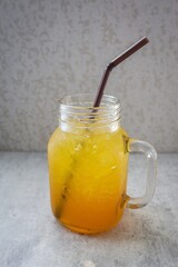 soft drink in glass jar with straw , summer drink