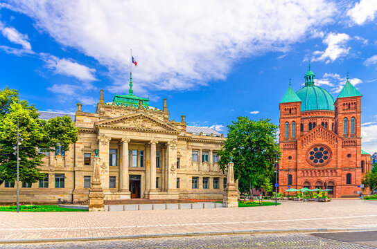Palais de Justice palace neo-Greek building and Eglise Saint-Pierre-le-Jeune Catholic Church Romanesque Revival architecture on Place Gisele Halimi square in Strasbourg city centre, France