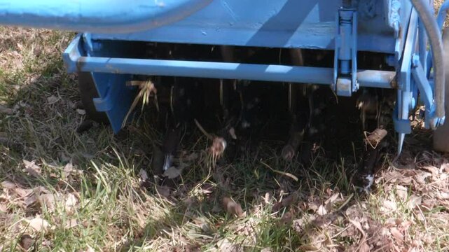 Closeup of Lawn Being Aerated
