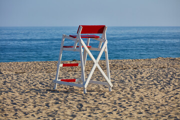 Red and white lifeguard chair