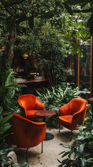 A garden café with orange chairs and velvet armchairs
